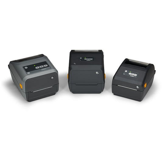 Three Zebra label printers of different sizes on a white background
